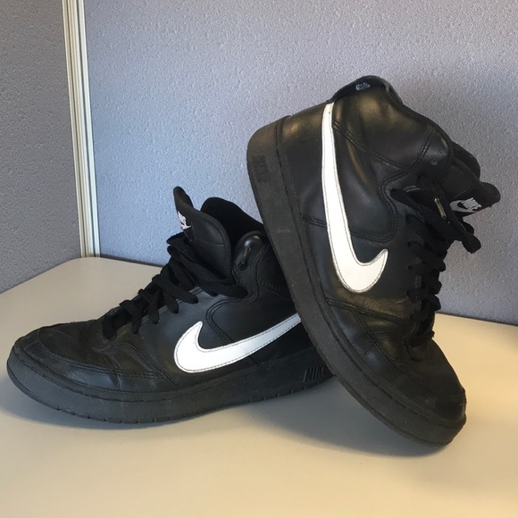 black nike with white check